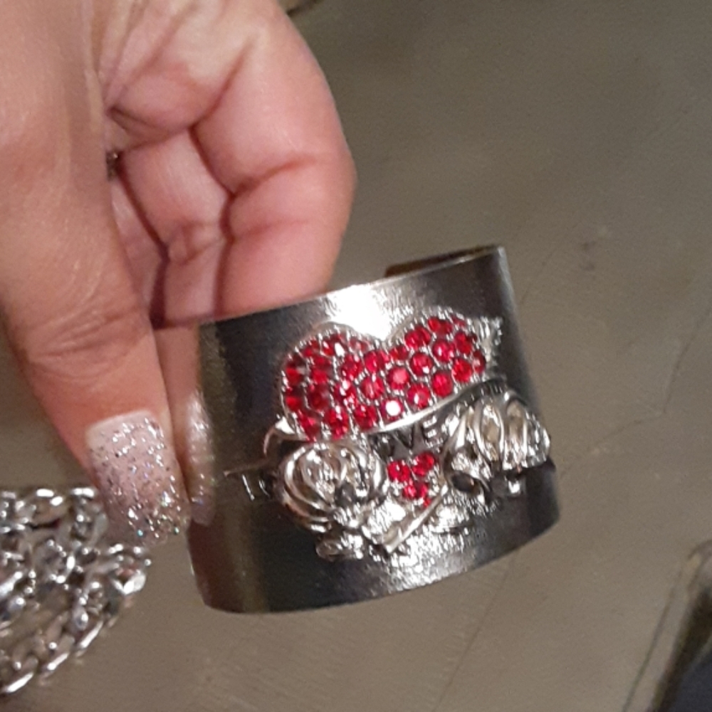 New bracelet with a red heart and roses.